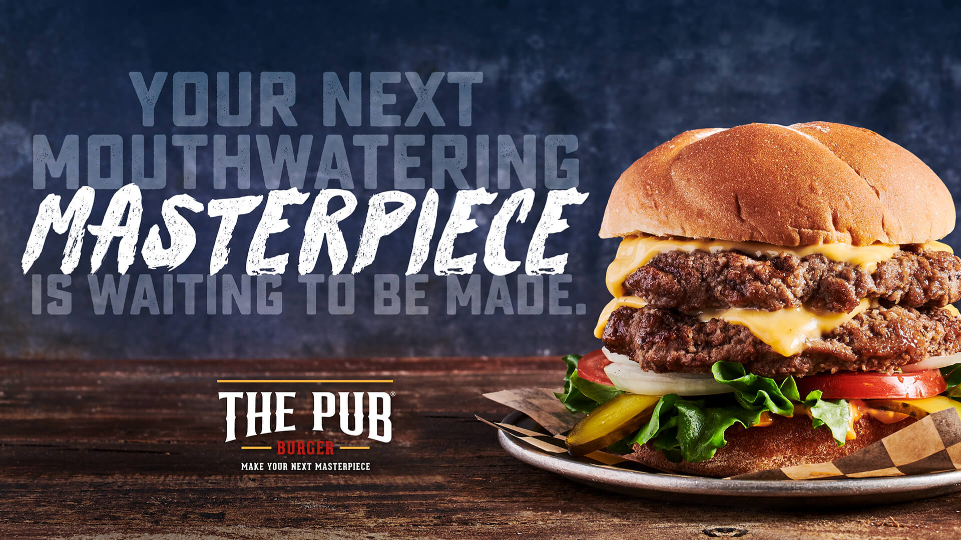 The Pub® burger image on a table. Your next mouthwatering masterpiece is waiting to be made. Beef Rebrand.